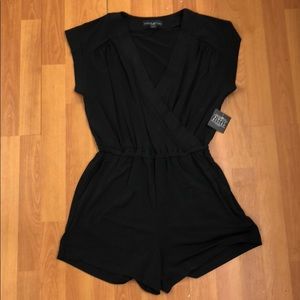 NWT black cap sleeve romper. Small